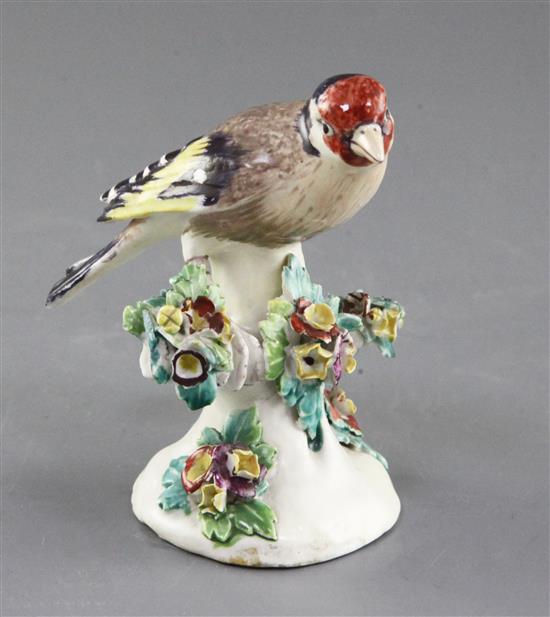 A Derby model of a goldfinch, c.1760-5, h.10cm, restored,